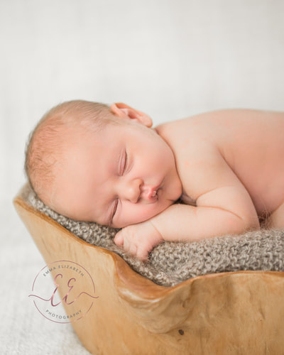 Prop posing newborn baby in a  root bowl. Newborn photography in St Neots, Huntingdon, Cambridgeshire