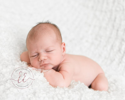 Emma Elizabeth Photography posing Newborn photography in St Neots, Huntingdon, Cambridgeshire