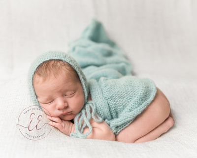 Mint newborn baby wrap. Newborn photography in St Neots, Huntingdon, Cambridgeshire